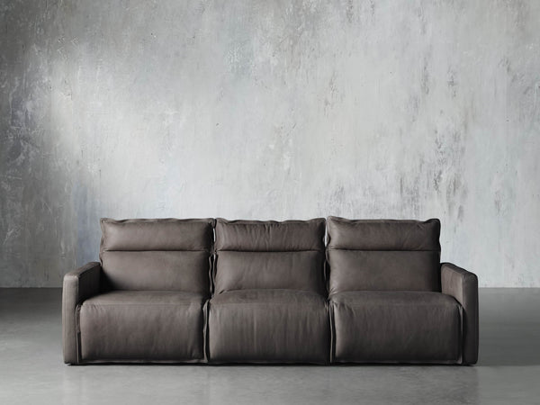 Rowland Leather Three Piece Motion Modular Sofa